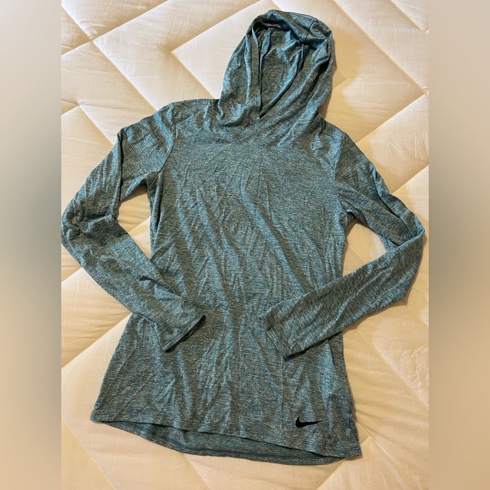Women’s teal hooded Nike Dri-Fit top. XS